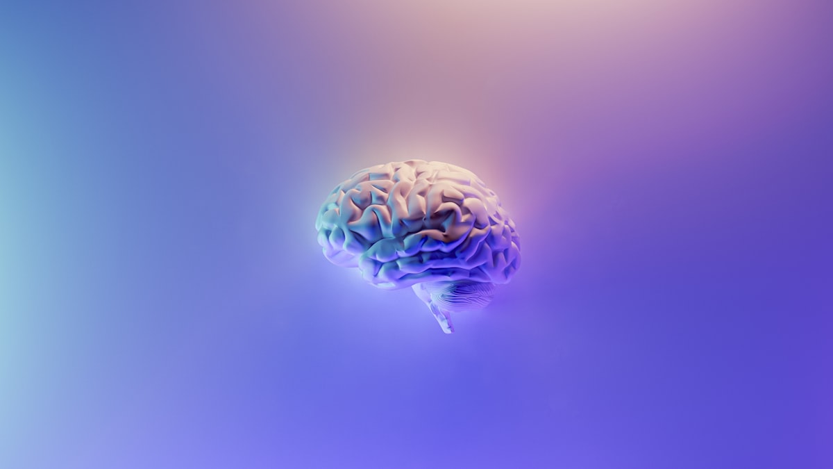 Psychology textbook with brain diagram and neural network illustration