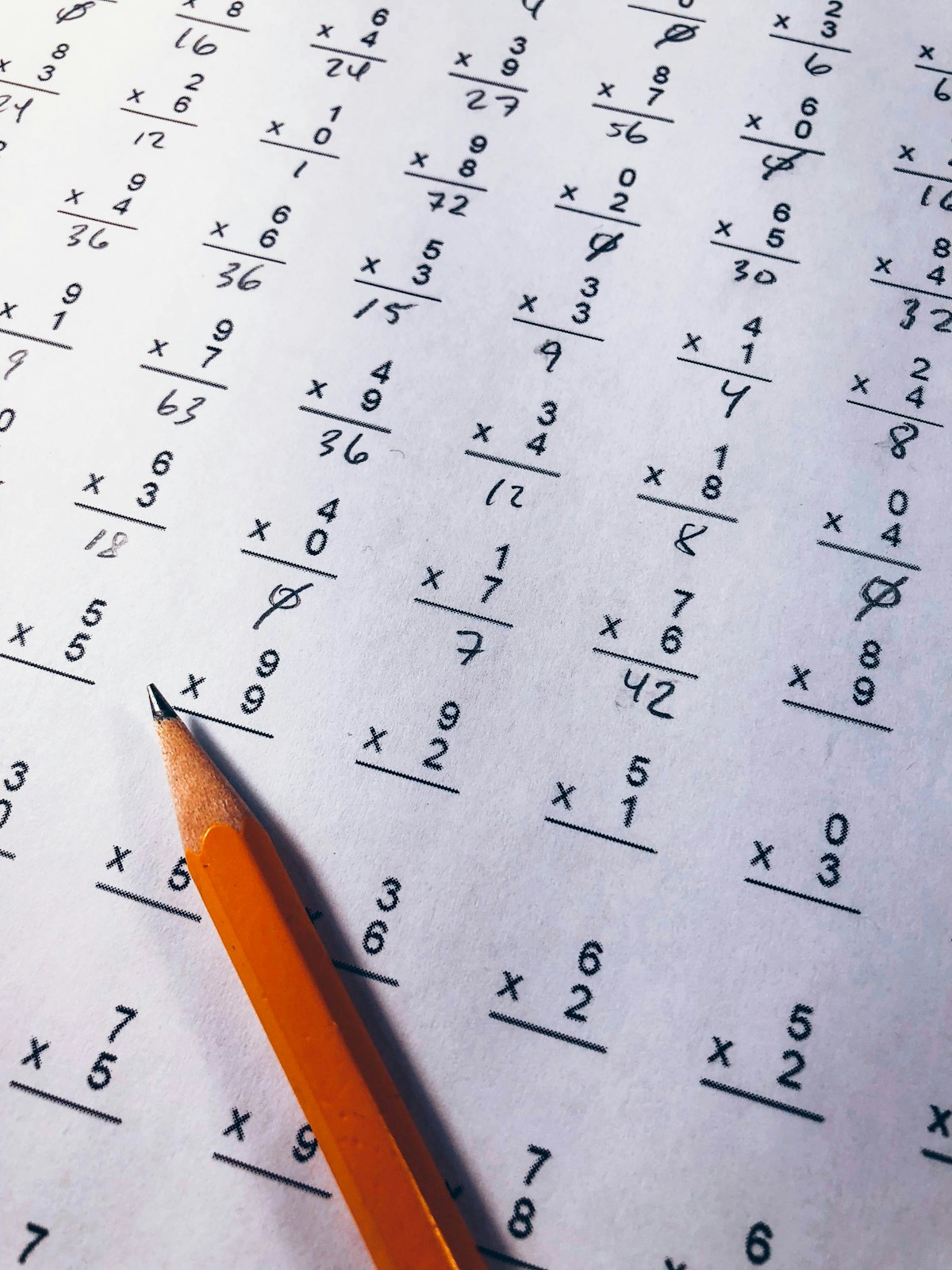 Math notebook with geometry equations, compass and ruler