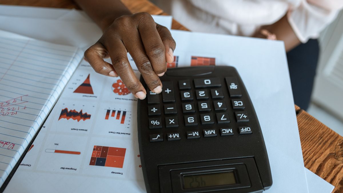 A percent sign with a calculator