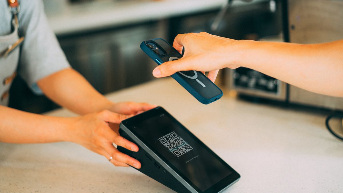 A smartphone scanning a QR code